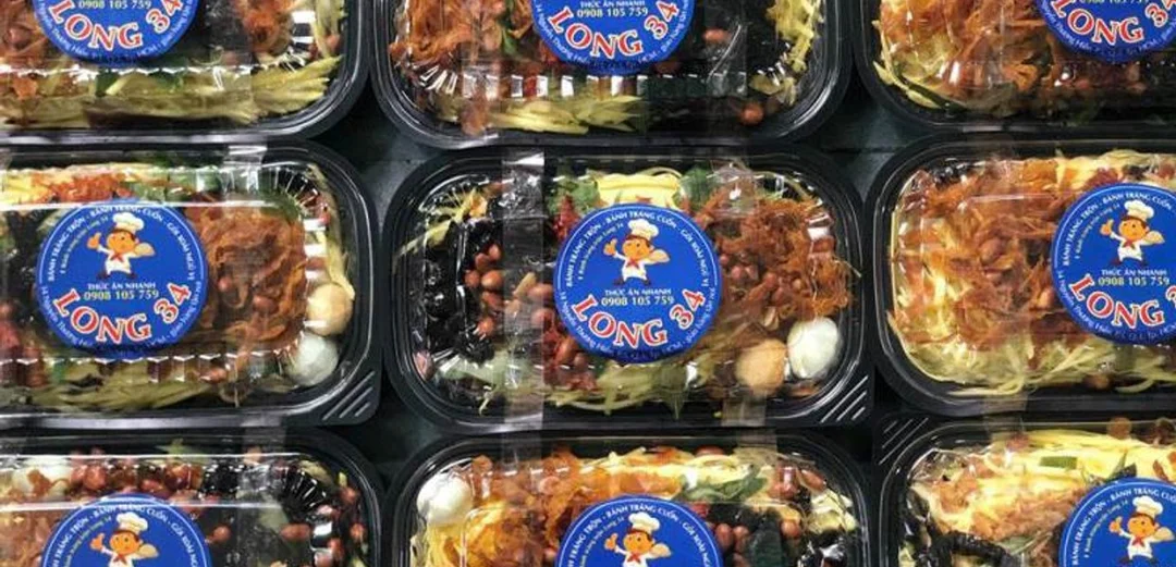 bánh tráng trộn long tại Nguyễn Thượng Hiền nhiều topping